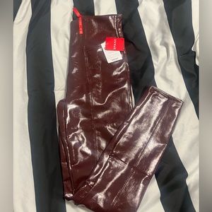 Spanx Faux Patent Leather Leggings in color Ruby size small NWT